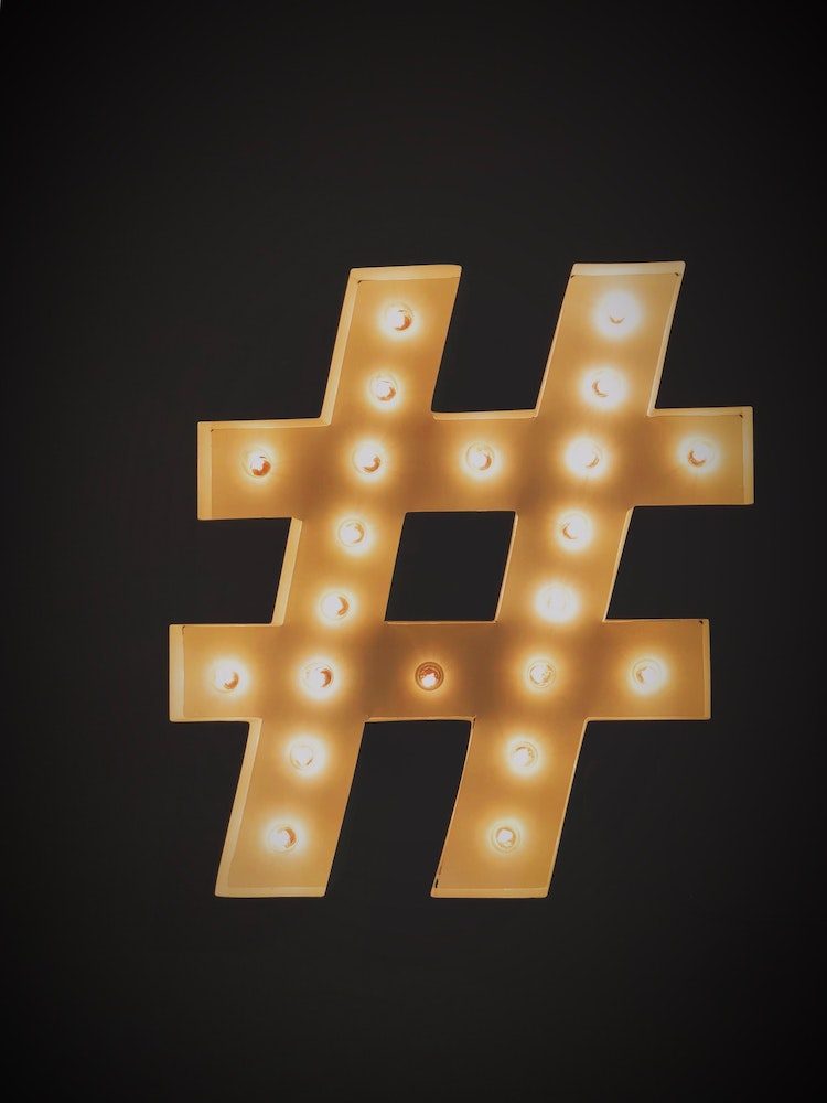 Hashtag in lights - Hashtag - Photo by Jon Tyson on Unsplash