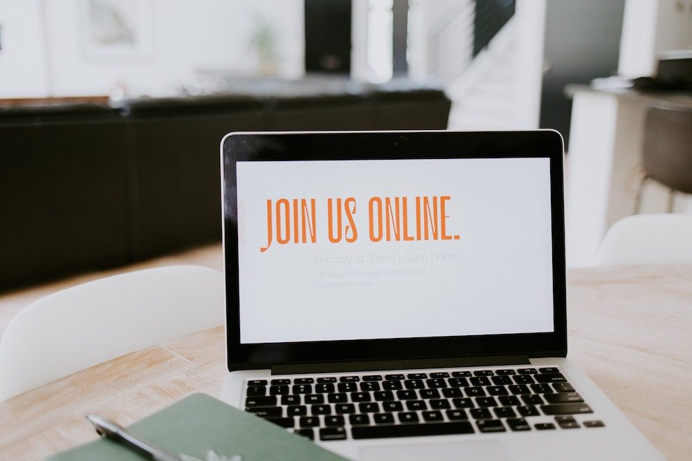 Macbook with 'Join us online' - Photo by Samantha Borges on Unsplash